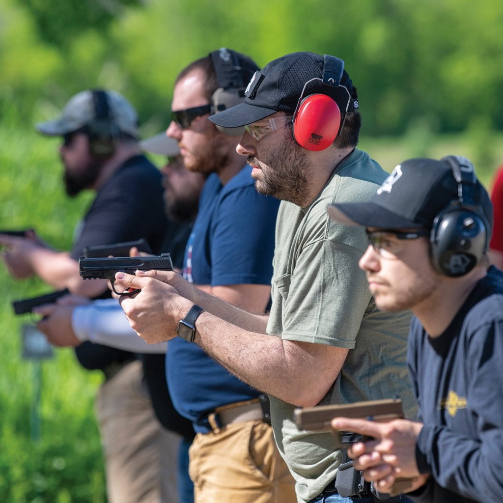 Shooters in a Defensive Pistol Training class.