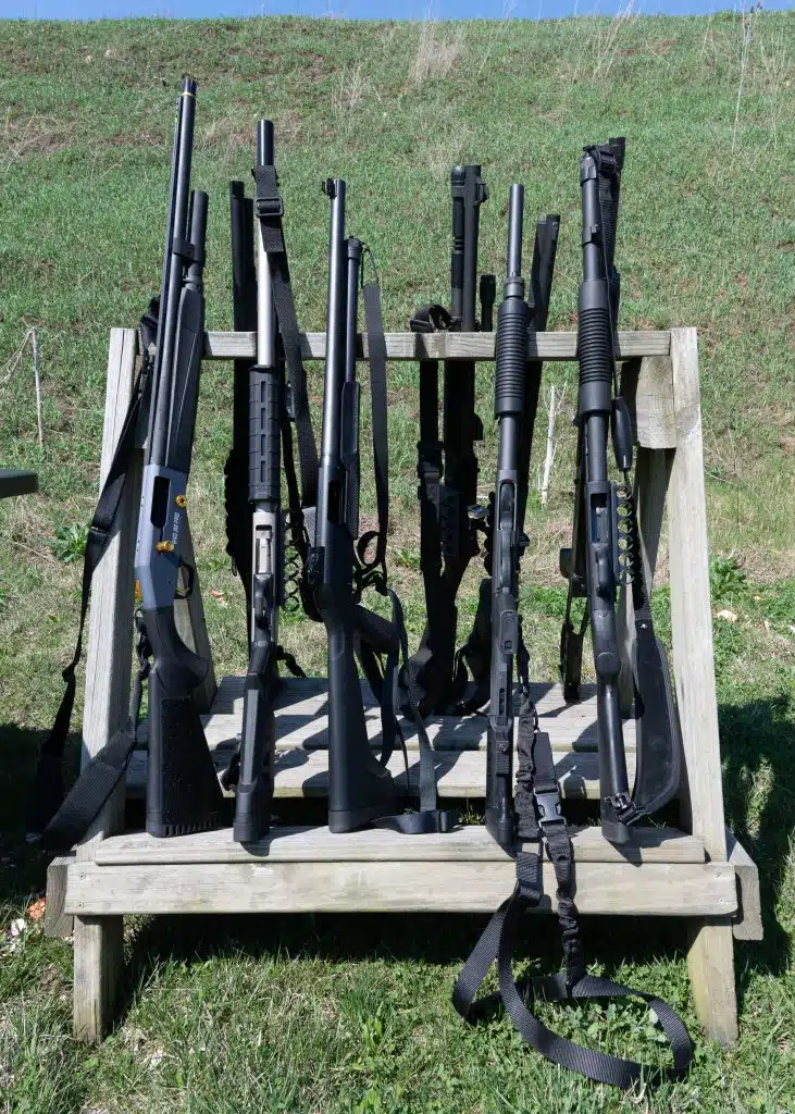 A rack of tactical shotguns at a training class.